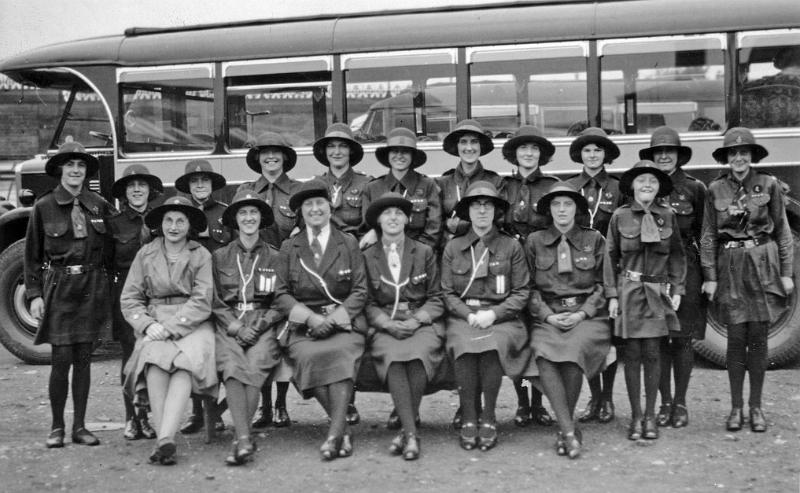 Girl Guides Outing.JPG - Girl Guides Outing - ( Possibly around 1930 )  Front row: 3rd from left Mrs Denton - Captain of the Guides                     4th from left Helen Heaton,  - standing at end of front row May Todd  ( Can anyone confirm the date & event, or recognise any of the other girls ? )  